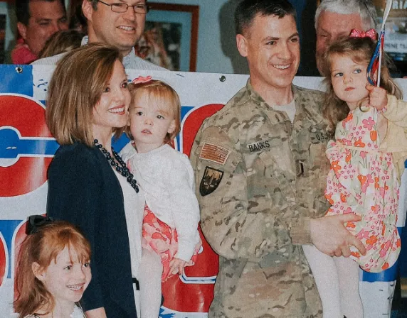 Senator Banks with family in uniform