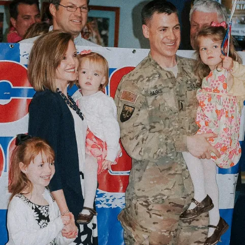Senator Banks in uniform with family